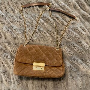 Micheal Kors medium suede shoulder/crossbody bag.